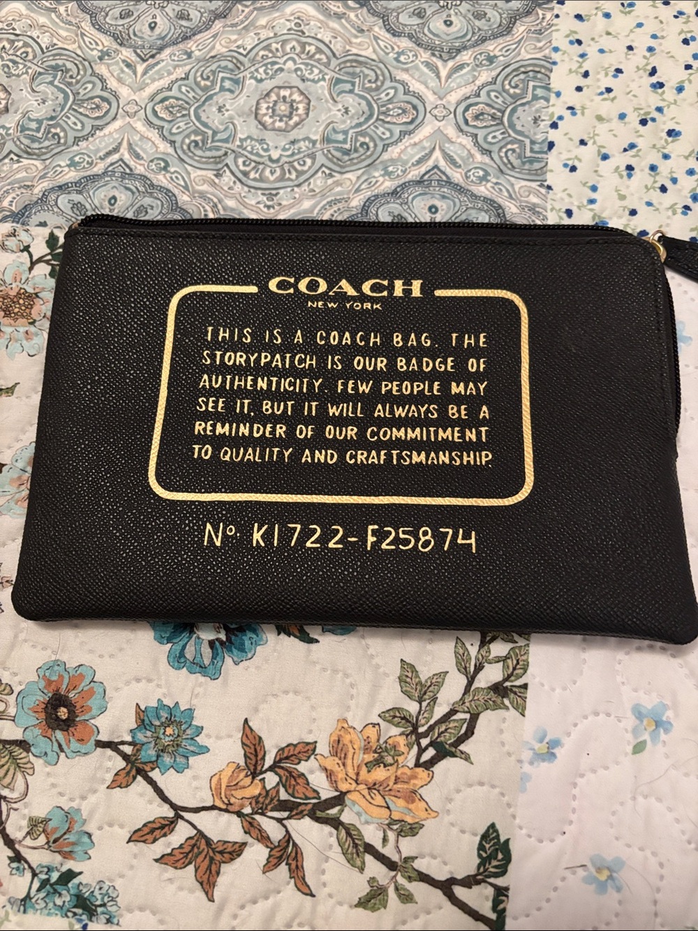 Coach Black Pouch with Gold Script Logo